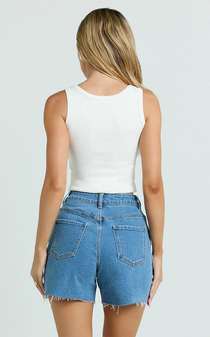 Jacqui Shorts - Mid Rise Frayed Hem Denim Shorts in Light Mid Blue